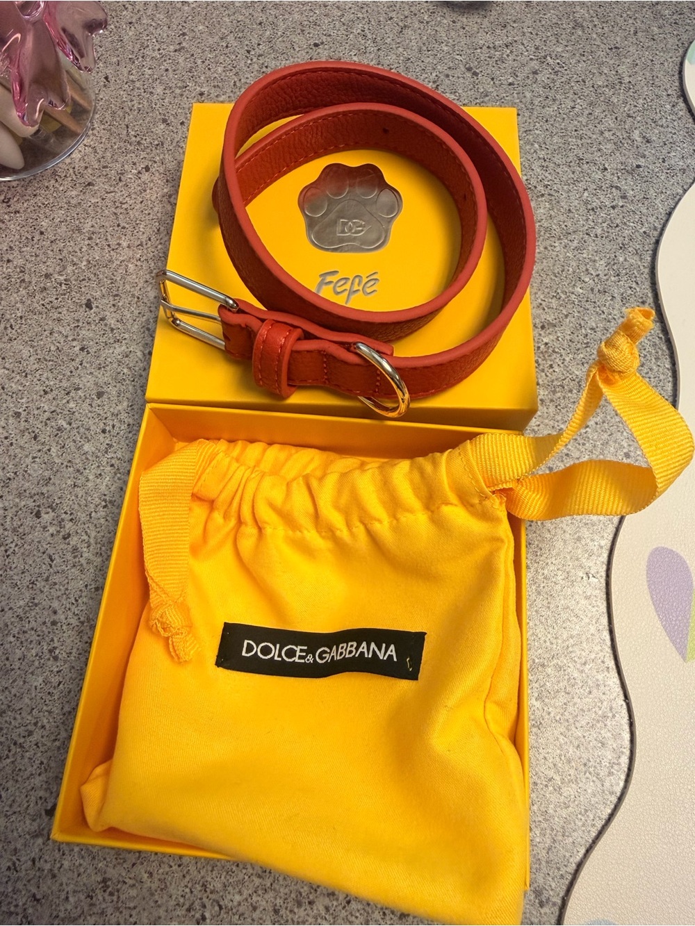 Dolce & Gabbana Red Leather Strap with Yellow Branded Pouch with out charm.